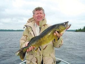 Robert Peterson of Voyageurs Point spent a windy day fishing with guide Mike Berg, Wednesday, July 14. This nice walleye is 11 pounds and was 29.5 inches.