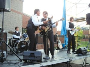 The Grand Marais Playhouse celebrated its 40th anniversary Sunday, July 25, 2010 outside the Arrowhead Center for the Arts. The crowd included many past and current volunteers, supporters, and cast and crew members. Following a barbecue picnic, people danced to the Beatle-esque Cavern Beat.