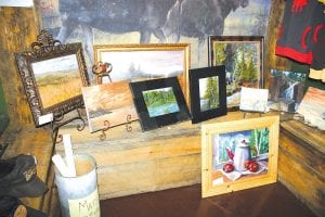 A rustic gallery! At several lodges and resorts along the Gunflint Trail, the artists taking part in the Gunflint Trail Plein Air Celebration have beautiful artwork on display.