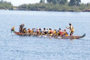 The fired up drummer of the Fired Up Puppies of Grand Marais vigorously encouraged her team at the Saturday, July 31 Dragon Boat Races.