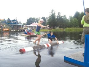 Jessica wins again! Jessica Berg-Collman of Grand Marais placed third at the Lumberjack World Championships in Hayward, Wisconsin last weekend, rolling for a total 25 times and winning 20 of those rolls. Above: In one of those rolls, Jessica toppled opponent Rachel Ellis. Ellis went on to claim first place in the World Championship. Congratulations, Jessica!