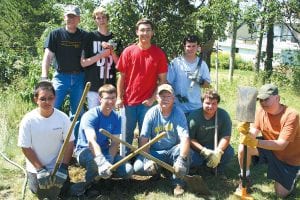 This team of hard-working Boy Scouts and several parents spent a long day sprucing up the parking lot of the new Cook County Higher Education facility. (L-R, front) are: Rusty Day, Alex Ditmanson, Dan Baumann, Jonathan Baumann and Aaron Breitsprecher. (L-R, back) Mark Ditmanson, Kyle Martinson, Daniel Ditmanson and Zach Baumann.