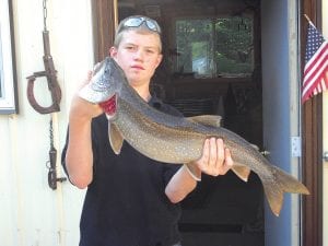 Richie Furlong, 13, recently moved from Indiana to Grand Marais—just in time for some great fishing! Richie caught this 8½-pound, 28 ½-inch lake trout on an undisclosed lake on Saturday, July 31.