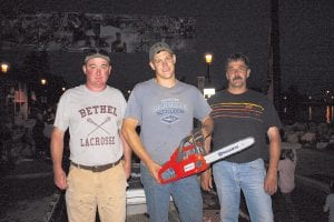 Colee Johnson of Hovland won the Steve’s Sports/Husqvarna stock saw contest, winning a brand-new chainsaw. Second was Dennis Burton (right) and third was Tom Stockman. Congratulations all!