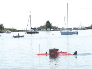 It is not known if there has ever been a submarine in the Grand Marais harbor. But thanks to the Fisherman’s Picnic boat parade, there has now! This little orange (not yellow) submarine made an appearance at the Fisherman’s Picnic boat parade on Saturday, August 7.