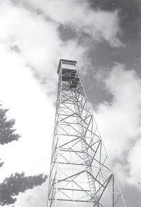 This picture from the Richard Fink photo collection is dated August 1951. It shows the Lima Mountain Lookout Tower. Fink recalls that there were several of these towers around at this time. There was another at the east end of West Bearskin Lake, a bit east of the Clearwater Road, which was easily seen from Caribou Rock. Others were at Pine Mountain, Brule Lake, to the west of Gunflint Lake and Kekekabic Lake. These towers were manned during the fire season. When a plume of smoke was spotted, the towers were used for triangulation and the precise location of the smoke source could be identified. Crews would then be sent in to fight the fire. Aircraft ultimately took over the function of these towers, and the towers were eventually disassembled.