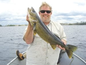 Brad Ludlow of Lutsen had a great day of fishing on August 13—Friday the 13th. It was a lucky day for Brad, who caught this very nice 29 ½ inch, 9 ½ pound walleye on Lake Saganaga. Brad was fishing with guide Mike Berg of Seagull Creek Outfitters. He was fishing with bobbers and “jumbo leeches” in about 15 feet of water. The lunker was released.