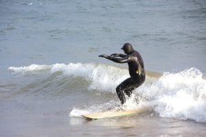 Lake Superior beaches are known more for agate or thomsonite picking and rock skipping than surfing, but occasionally a hardy soul appears to take on the Big Lake waves. This surfer was spotted on the lake near Colvill, plying the waves in the 68-degree water.