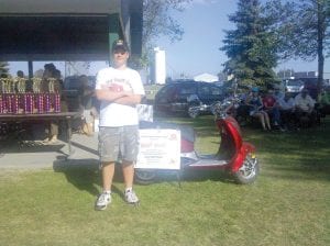 Trevor Wilson, 15, won this 2010 Lance Scooter and $150 cash at the Potato Days Festival car show in Barnesville, MN. Trevor is the son of Jay and Sheila Wilson and the grandson of Terry and Donna Wilson and Dick and Detta Buchheit, both of Grand Marais.