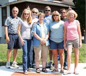 Old friends meet spontaneously in the neighborhood where they grew up. Front: Liz (Erickson) Strain, Patty (Eckel) Nelson, Jodi (Eckel) Stanford, Kristi Erickson. Back: Steve Dockan, Marianne (Leonard) Kauma, Mickey Brazell and Donny Brazell.