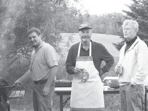 The Grand Marais Lions Club wrapped up summer with a steak fry at Gunflint Hills Golf Course in Grand Marais. Manning the grill were Lions Andrew Smith, Bill Hennessy and Mike Carlson.