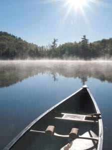 Although this is not the canoe carried by the hearty wilderness guides, this is surely a restful scene they could appreciate at the end of their trek.