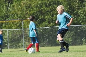 Ethan Sporn gets ready to charge the goalkeeper and attempt to score a goal. Youth soccer is a big sport in Cook County, with more than 150 kids going out each fall for the number one sport in the world.