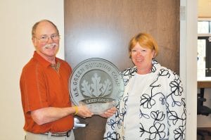 Arrowhead Electric Cooperative Inc. General Manager Don Stead has announced his resignation from the electric cooperative. He is accepting a position at Homer Electric Association in Homer, Alaska. Assistant Manager Jeanne Muntean will be the interim manager. The two worked together to earn LEED certification from the U.S. Green Building Council and are pictured here with the award received in June 2010.