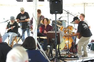 The third annual Radio Waves Music Festival, a two-day event was held at the Grand Marais Rec. Park on Friday and Saturday, September 10 -11. The fabulous familyfriendly festival was a partnership between WTIP Community Radio and the North Shore Music Association. Above: Cook County’s Most Wanted—Gary Croft, Al Oikari, Snuffy Smith, Carah Thomas, Rod Dockan, with Rick Brandenburg standing in—rocked the Big Top with their alternative country, country rock, classic rock and more. Right: Timmy Haus played an acoustic eclectic set to get the crowd in the dancing mood.