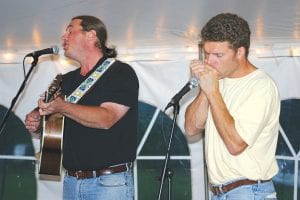 Bump Blomberg, a popular member of a number of local groups, was joined by the talented harmonica Jim Elverhoy, who dazzled the crowd with his harmonica collection.