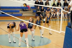 Cook County Vikings volleyball is off to a great start, winning its first two matches on the road against Duluth Marshall and Silver Bay, and this match against Floodwood at home on September 9. Above: Forming a formidable line while waiting for the Silver Bay serve were Bekah Laky, Ashley Deschampe and Ali Iverson. Right: Ashley “Dish” Deschampe puts the ball over the net. Deschampe led the Vikings against Floodwood with 18 kills. The Vikes are 3-0 overall and 2-0 in the Polar League.