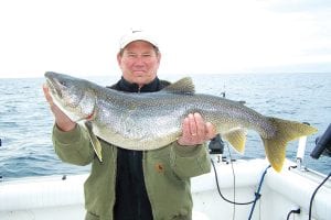 Mark Knutson from Lakeville, Minnesota, caught this huge 19-pound, 36-inch lake trout on September 15 with Captain Darren Peck of Tofte Charters.