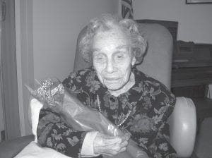 Bertha Toftey was all smiles with her red rose. Bertha will be 102 years of age on November 24th.