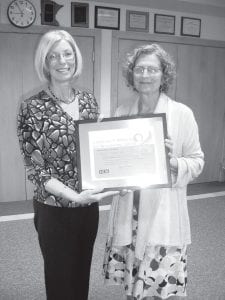 Cook County Public Health and Human Services Director Sue Futterer (L) and Sawtooth Mountain Clinic Director Rita Plourde at the Cook County courthouse September 21, 2010 with a certificate from the Minnesota Department of Health for the Cook County Women, Infants, and Children (WIC) nutrition program. WIC was honored by the Minnesota Department of Health for achieving several U.S. Department of Health and Human Services Healthy People 2010 breastfeeding goals. Over 94% of Cook County infants in the WIC program are breastfed after birth. Of those babies, 72% are still breastfed at least six months later, and 28% continue to be breastfed for one year or longer. Healthy People 2010 is a set of objectives designed to prevent disease and promote health in America over the first decade of the new millennium. Its goals are to increase quality of life and longevity and eliminate health disparities.