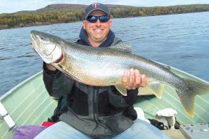 Captain Darren Peck enjoyed fabulous fishing in the closing days of the 2010 Lake Superior lake trout season. Darren was a guest on Dick Nelson’s “Free Loader Charter Service.” No weight is available—Dick explains, “No scale aboard—economy boat.”