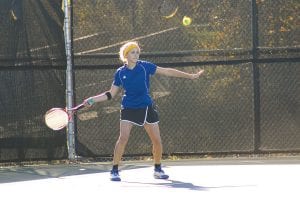 Molly Zafft gets in position to hit a forehand winner against her opponent, Lisa Erickson from Duluth Central. Zafft defeated Erickson in two straight 6-4, 6-2.