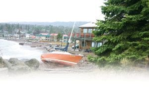 Bertil Lindquist’s sailboat was blown from its safe harbor mooring onto the beach near the Trading Post due to the high winds that blew through the area Wednesday, October 27.