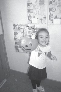 Carissa Bickford, age 4, worked “for days and days” on her bear picture for the Cook County News-Herald coloring contest. Here she is showing off her pumpkin filled with her winning prizes for the 4-6 year old age group. The judges all commented on Carissa’s wonderful picture and her even more glorious smile.