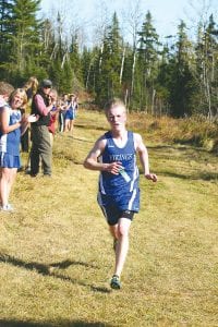 Sophomore Kieran Scannell ran a furious pace at the State cross-country meet on November 6, finishing 34th in a tough field at St. Olaf College.