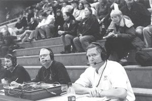 Norman Moe and Dick Dorr, pictured here at a basketball playoff game in 2002, have been providing play-by-play coverage of basketball and football games for WTIP Community Radio for many years. Vikings fans appreciate their hard work and hope that someone knowledgeable about volleyball will come forward to do the same for volleyball.