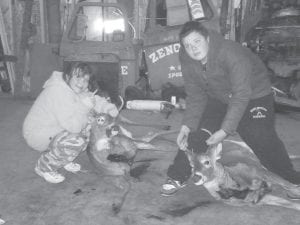 Breyer McQuatters, 14, and Trace McQuatters, 12, of Grand Marais, had an awesome first day of deer firearm season. Breyer (right) got a five-point buck and Trace got a fourpointer, her first deer ever. They are the children of Clint and Sandi McQuatters of Grand Marais.