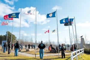 Blue skies and strong winds made the flags wave proudly at the Grand Portage Veterans Monument on Thursday, November 11. Flags also waved at Harbor Park in downtown Grand Marais and at a special Veterans Day concert at Cook County Schools. Read about those activities on pages A3 and B1.