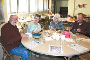 Enjoying the lunch hour serving of soup and bread at this year’s Empty Bowls fundraiser for the Cook County Food Shelf at First Congregational Church in Grand Marais on November 11 were (L-R) Bill Lenz, Gwen Lenz, Virginia Hahn, and David Hahn.