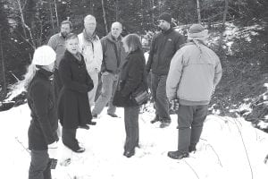 Cindy Gentz, (black coat facing camera) Water Plan Coordinator for the Cook County Soil & Water Conservation District, explains the “Ullr Tightline Project” to a group of people who attended the Poplar River Kick-off event that occurred on Saturday, Nov. 20. The goal of Gentz and several groups she works with is to reduce the sediment and improve the turbidity of the Poplar River.