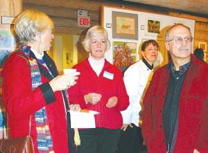 It is always a pleasure for teachers to see their students excel. Former teacher Ann Mershon, Art Teacher Mary MacDonald, and retired Sawtooth Elementary Music Teacher John Redshaw discuss the show, while Cindy Muus (back) oversees the culinary arts class.