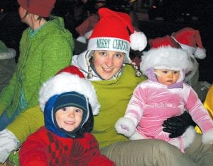 The Grand Marais Chamber of Commerce hosted its holiday parade on Tuesday, November 23, with the theme of “The Grinch Stole Christmas.” There were a few gangly green fellows and quite a few little residents from Whoville in the parade through downtown Grand Marais. Agne Smith with her kids, Noah, 3, and baby Lilija, 1, had fun on the Sven & Ole’s Pizza float. See more pictures of the Christmas Parade on A3.