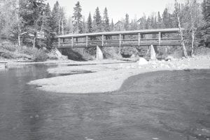 Although the Minnesota Pollution Control Agency and the Poplar River Management Board are concerned about the amount of sediment in the Poplar River, the river looks lovely as it meets the Lake Superior shoreline near Lutsen Resort.