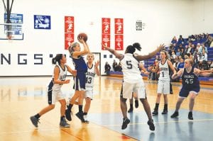 Breana Peterson found a seam in the Falcons' defense and went up for a jump shot. Breana is the only freshman on the varsity, and although she’s not a starter, she gets minutes coming off of the bench.