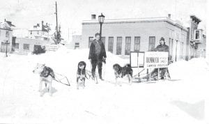 This very interesting photo from the Cook County Historical Society is annotated simply “Naniboujou mushers.” The mushers are advertising the Ironwood Winter Sports Carnival. Are they visiting from Ironwood? But then why are they called the Naniboujou mushers? Are mushers from Naniboujou heading to Ironwood? Where was this photo taken? This historical photo raises many questions—can any readers provide the answers? If you would like to try to identify more old photos, visit the historical society’s “Who, What, Where” page at http://www.boreal.org/compage/pics/picarchive.html.