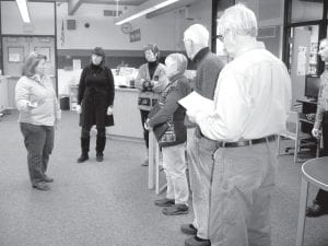 The ISD 166 school board took a tour of the school building Friday, December 10, 2010 to look at ways the school could make more efficient use of space as enrollment continues to decline. (L-R) Superintendent Beth Schwarz, Jeanne Anderson, Debra White, Mary Sanders, Rod Wannebo, Bill Huggins. They met with Wade Cold of ORB Management, a consulting firm that assessed and recommended ways to consolidate space.