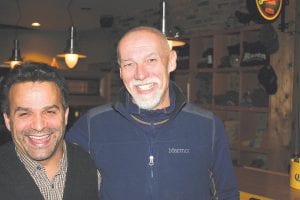 Lonnie Dupre and his expedition manager, Tom Surprenant at the Polar Climb Party, a send-off event for Dupre’s attempt at a solo climb of Mount Denali in January 2011.