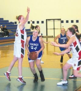 Brea Boomer scored two points on this lay-up in the game versus Cromwell. Boomer, like the rest of her team mates, have had a great bunch of games lately, losing only to Esko while beating teams like top ranked Mountain Iron-Buhl. The Viking girls play with a lot of skill, heart, and tenacity. Because of that, they are one of the favorites from Section 7 and have a chance to go to state this year.