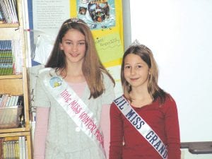 Fifth-grader Maya McHugh was crowned “Little Miss Grand Marais” by Faith Scamehorn, who is “Little Miss Winter Frolic.”