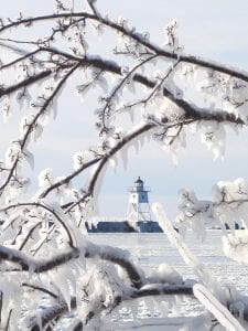 Mother Nature created an icy frame for this photo of the Grand Marais lighthouse last week. Thanks to Kris Buttweiler of Lutsen for braving the icy beach to capture this winter scene. See more of our North Shore winter wonderland on page A3.