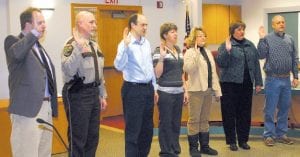 Taking the oath of office in the Cook County commissioners' room on Tuesday, January 4 were County Attorney Tim Scannell, Sheriff Mark Falk, Auditor-Treasurer Braidy Powers, Recorder Dusty Nelms, District 1 Commissioner Jan Hall, District 3 Commissioner Sue Hakes, District 5 Commissioner Bruce Martinson.