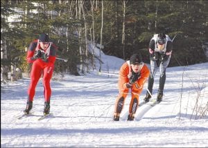 Racers in the men’s Freestyle 19K race complete their first lap in the Sawtooth International Cross-Country Ski Race on Sunday, January 9. Finishing the race under sunny skies was Shawn Miller, Duluth (left), who finished first in the earlier 9.5K Classic race with a time of 26:30.8. He also came in second in the Freestyle race. Nikolai Anikin, Duluth, (middle) finished first in the Freestyle race with a time of 48:47.7 and came in third in the Classic. Rhett Bonner of Duluth also finished well, coming in fourth in the Classic and third in the Freestyle. See the complete results on page B5.