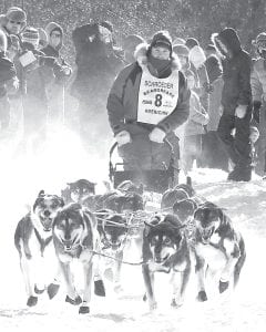 Gary Meinz of Lutsen is one of the photographers featured at the Great Lakes Aquarium until February 21. This photo of last year’s Beargrease winner Nathan Schroeder is a sample of Meinz’s work.