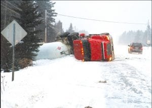 A 2005 International propane tanker lost control and skidded off the road near Mike’s Holiday in Tofte on Sunday, January 23. Highway 61 was blocked for several hours as emergency responders rescued the driver and ensured that propane was not leaking from the tanker. Residents of nearby homes and the AmericInn were evacuated while the tanker was pulled from the ditch.