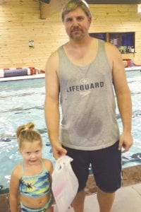 prize to win a at was thrilled her prize Taylor Everson the BIG Splash party. Taylor received Charles Christiansen. from head lifeguard