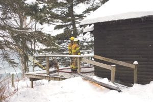 A fire call went out to the Lutsen Fire Department at 2:22 p.m. on Sunday, January 23. A cabin at Solbakken Resort was on fire. Firefighters used water and foam to extinguish the blaze. The fire severely damaged the walls and roof of the lakeside cabin. Lutsen firefighters removed burned material from the cabin.